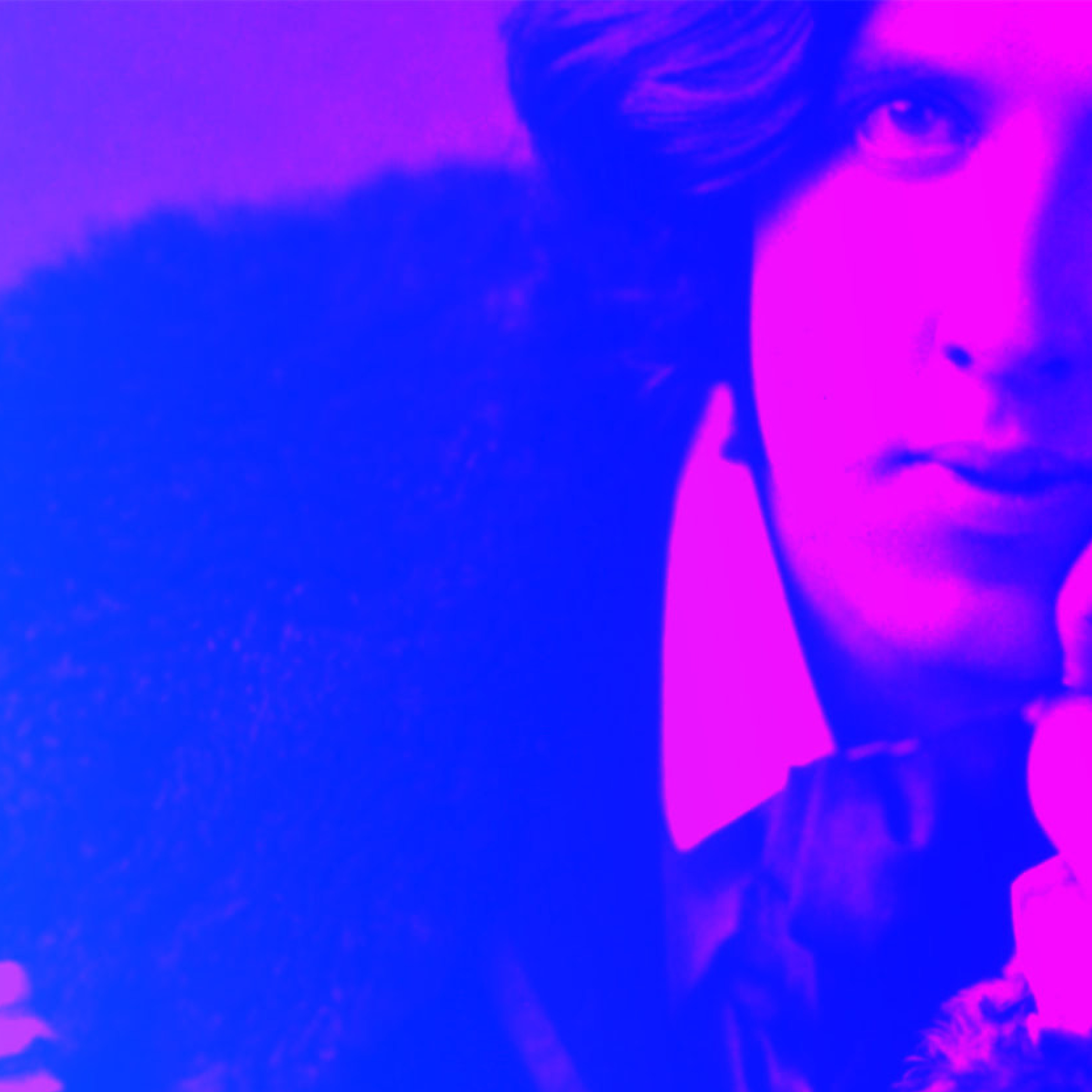 Colourful graphic featuring a photograph of Oscar Wilde